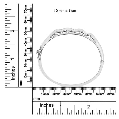 White metal bracelet with princess shape invisible set white gemstones, shown from the side on a ruler for size reference.