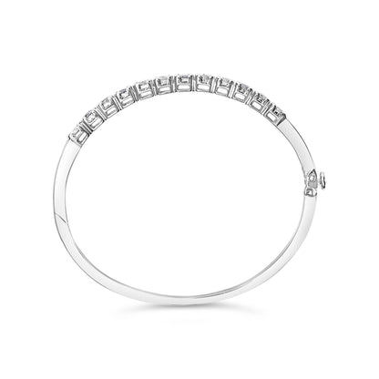 White metal bracelet with round white gemstones in a pave setting, shown from a top-down angle on a white background.