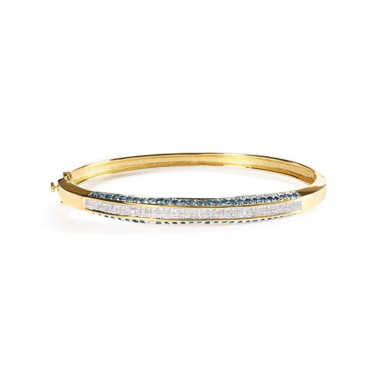 Yellow metal bracelet with white princess-shaped gemstones in channel setting and blue round gemstones in pave setting, shown in a front elevated side view.