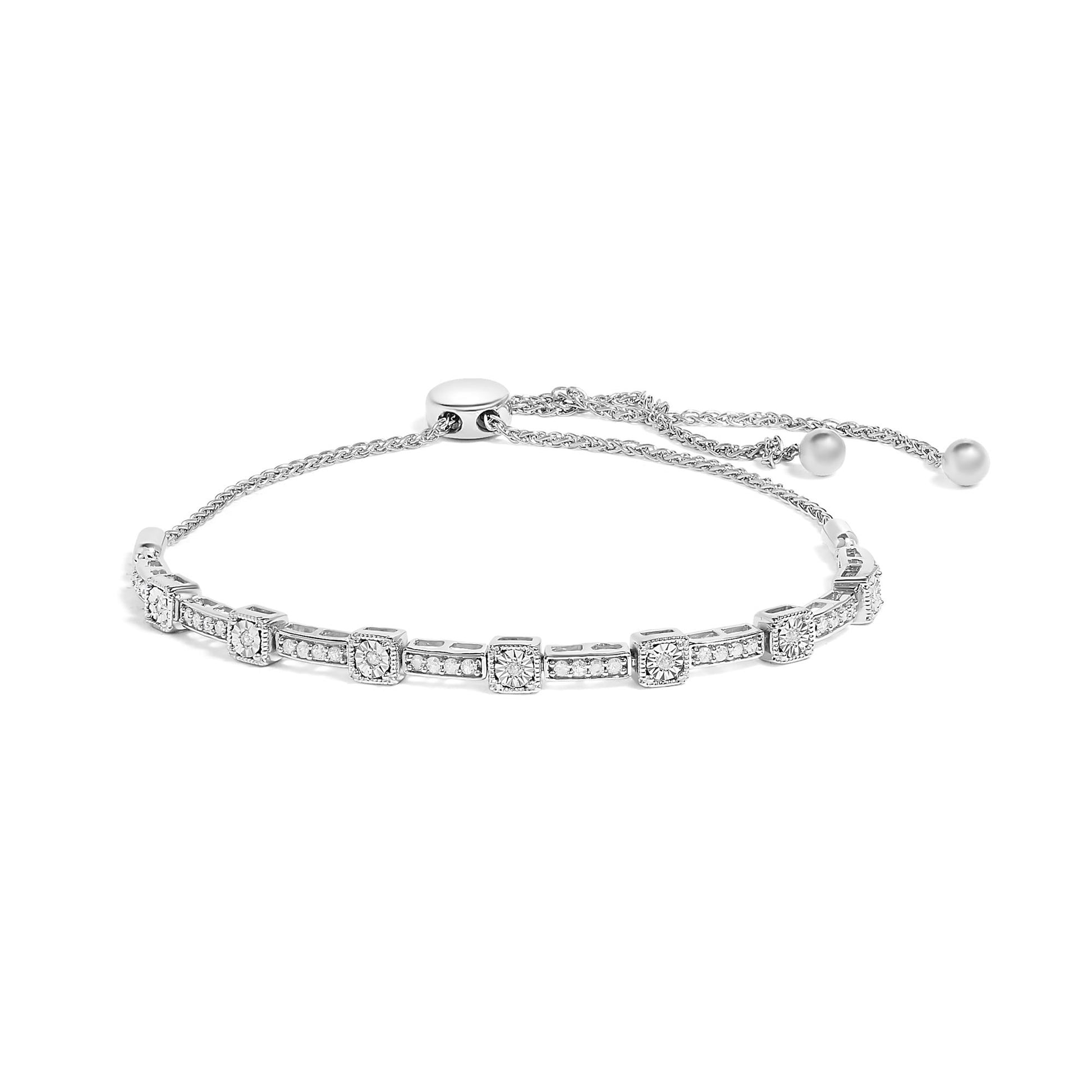 White metal bracelet with round white gemstones set in square frames and connecting bars, viewed from a front angle on a white background.