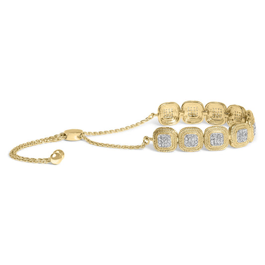 Yellow metal bracelet with square-shaped sections featuring clusters of small white gemstones, shown at a slight angle.