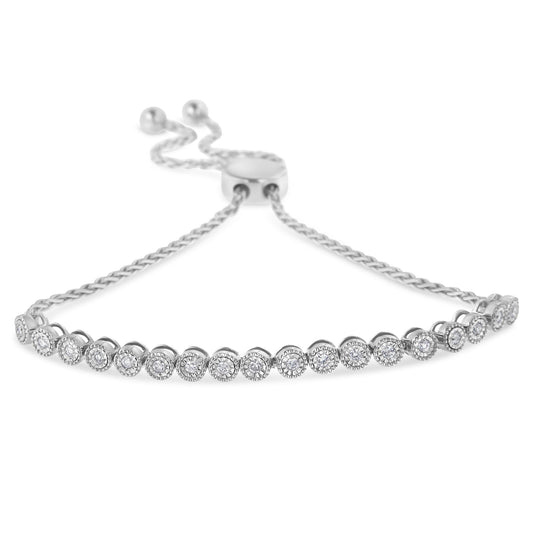 Bracelet with white metal chain and round white gemstones in miracle setting, front angle shot.