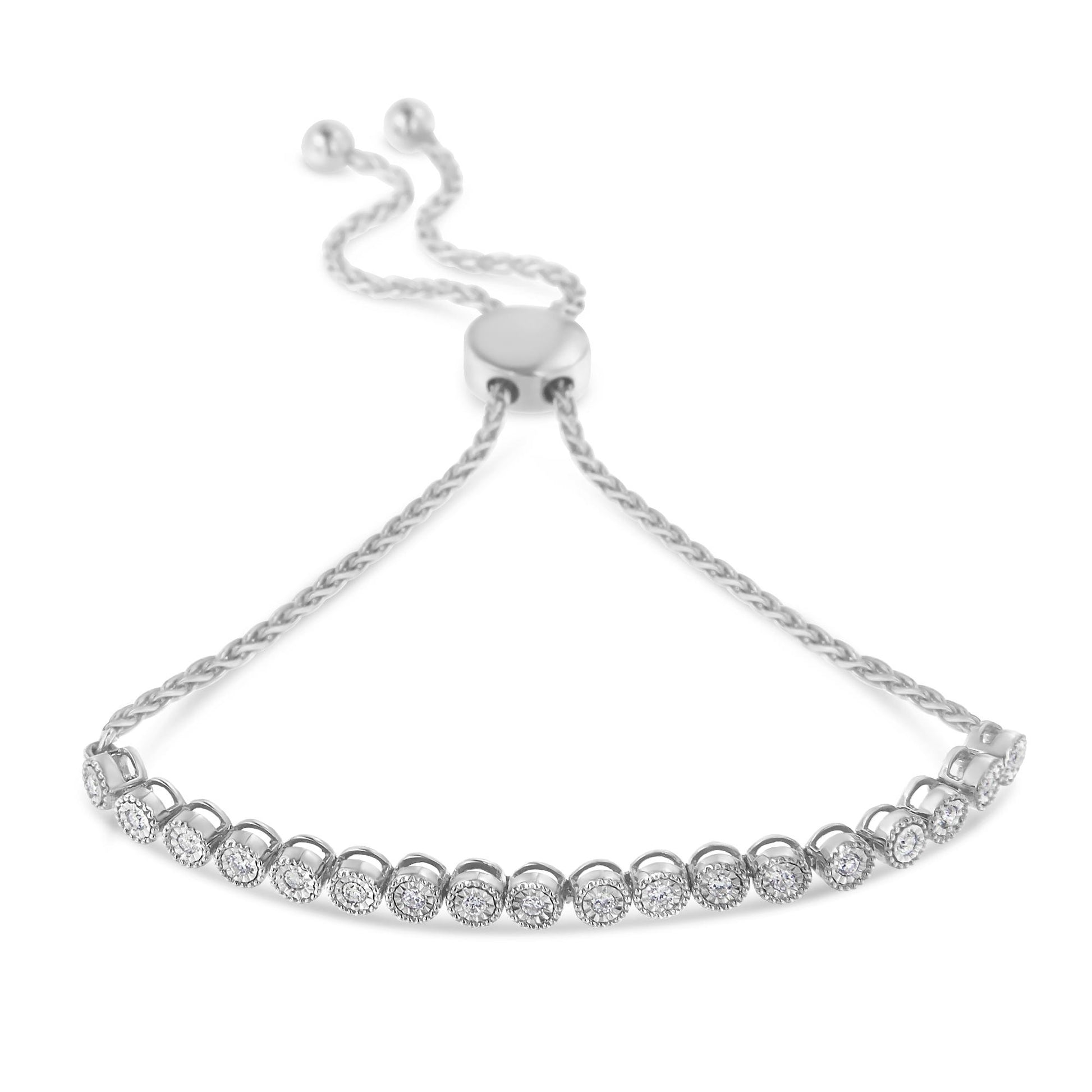 White metal bracelet with round white gemstones in miracle settings, shown at a slight angle from above.