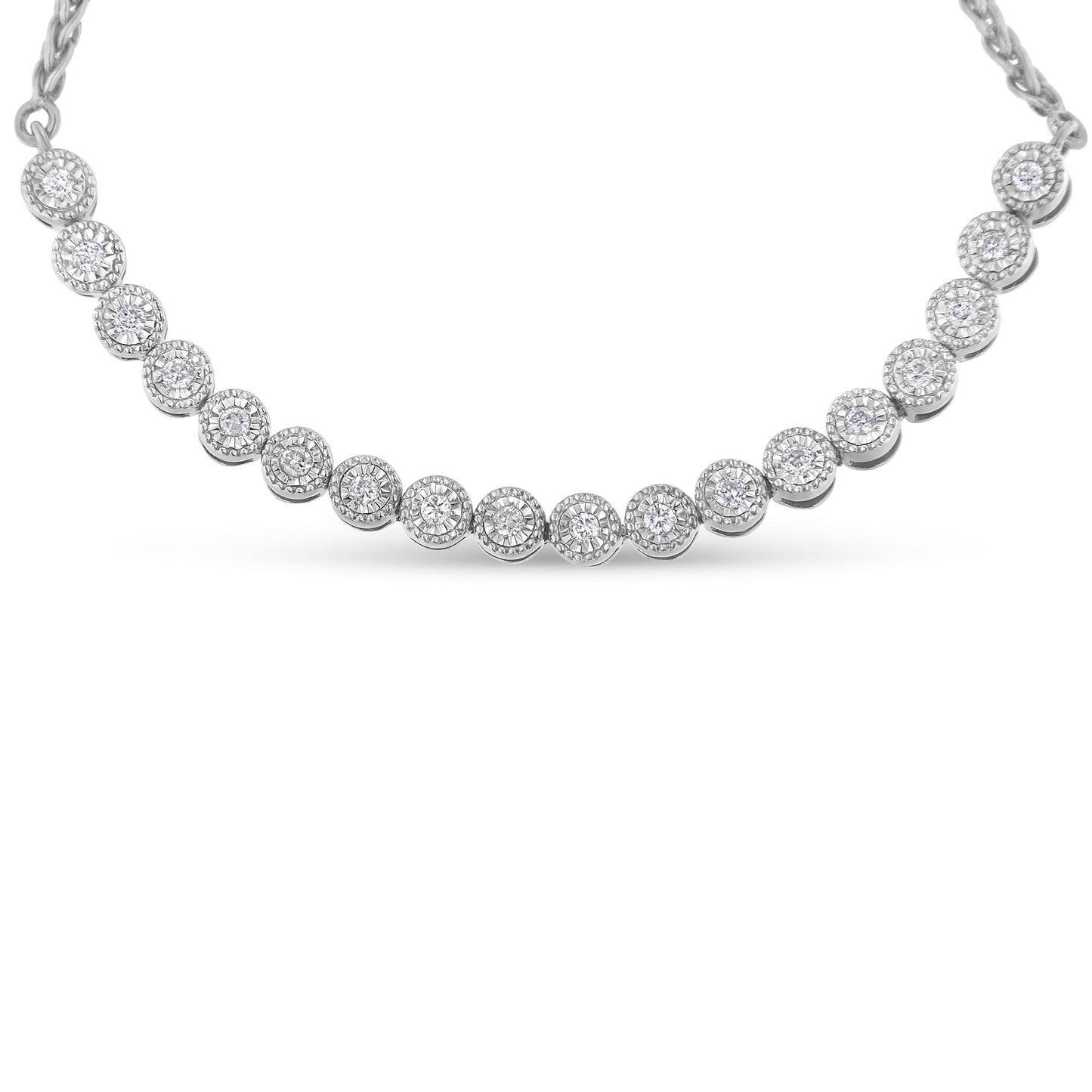 Close-up front view of a white metal bracelet with a row of round white gemstones set in a miracle setting.