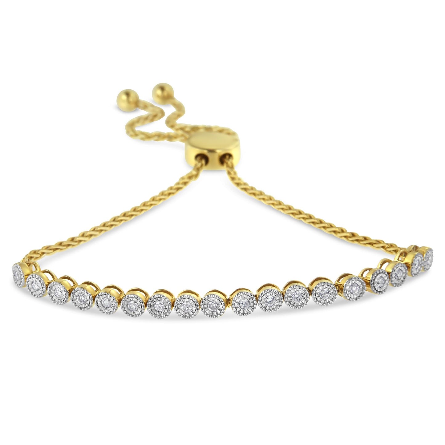 Yellow metal bracelet with round white gemstones in miracle settings, shown at an angled close-up.
