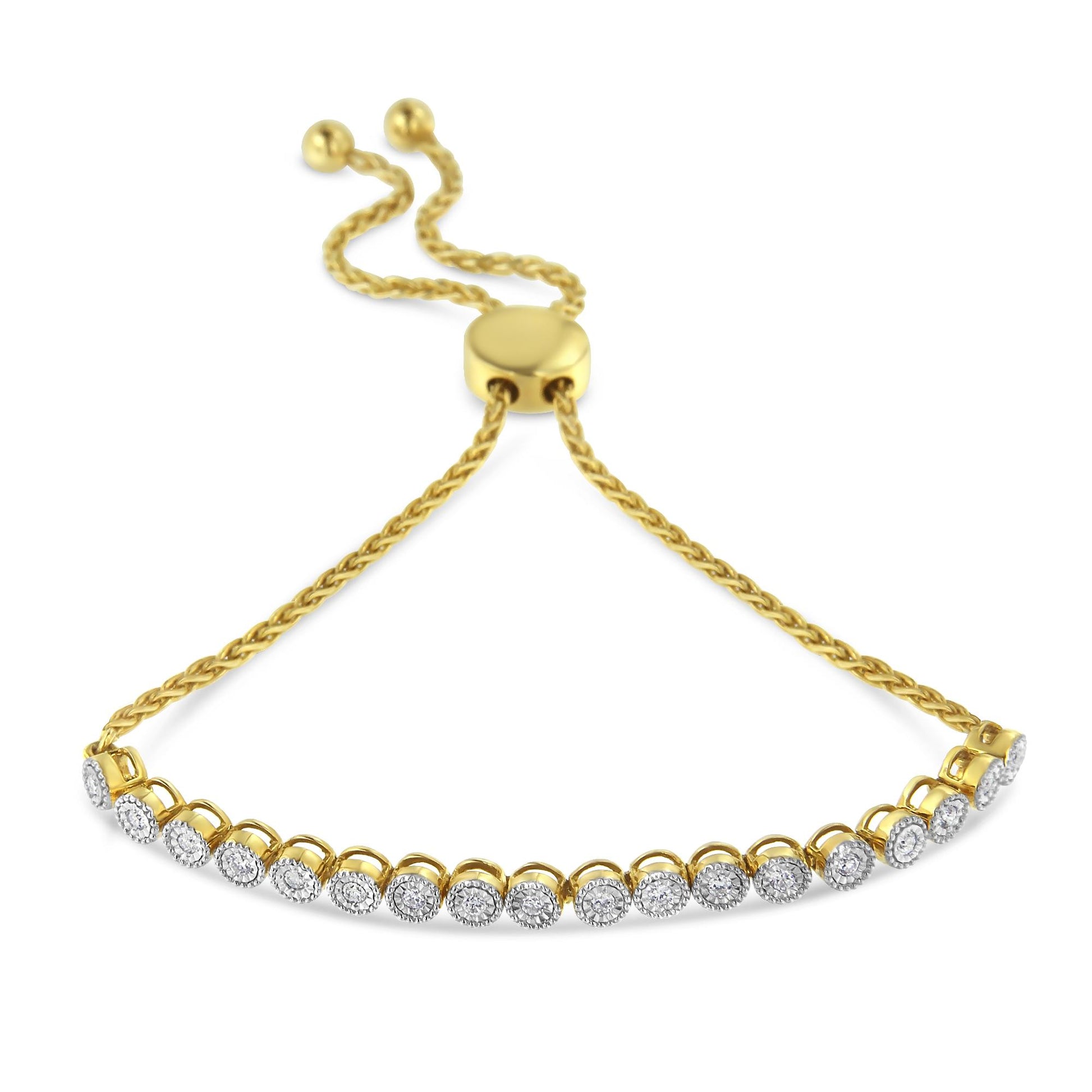 Yellow metal bracelet with round white gemstones in a miracle setting, shown from a slight front angle.