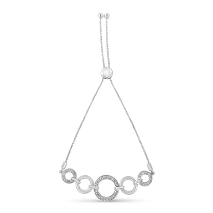 Front view of a white metal bracelet with linked round rings, some adorned with white gemstones in pave setting, shown against a white background.