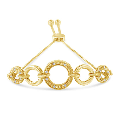 Front angle view of a yellow bracelet with interconnected circular links, some adorned with small white gemstones in pave setting, and an adjustable slider clasp.