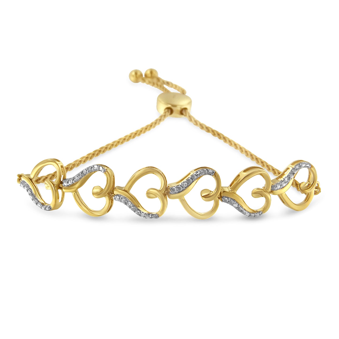 Yellow metal bracelet with alternating heart shapes and curved lines set with small white gemstones, shown from a slightly elevated front angle.