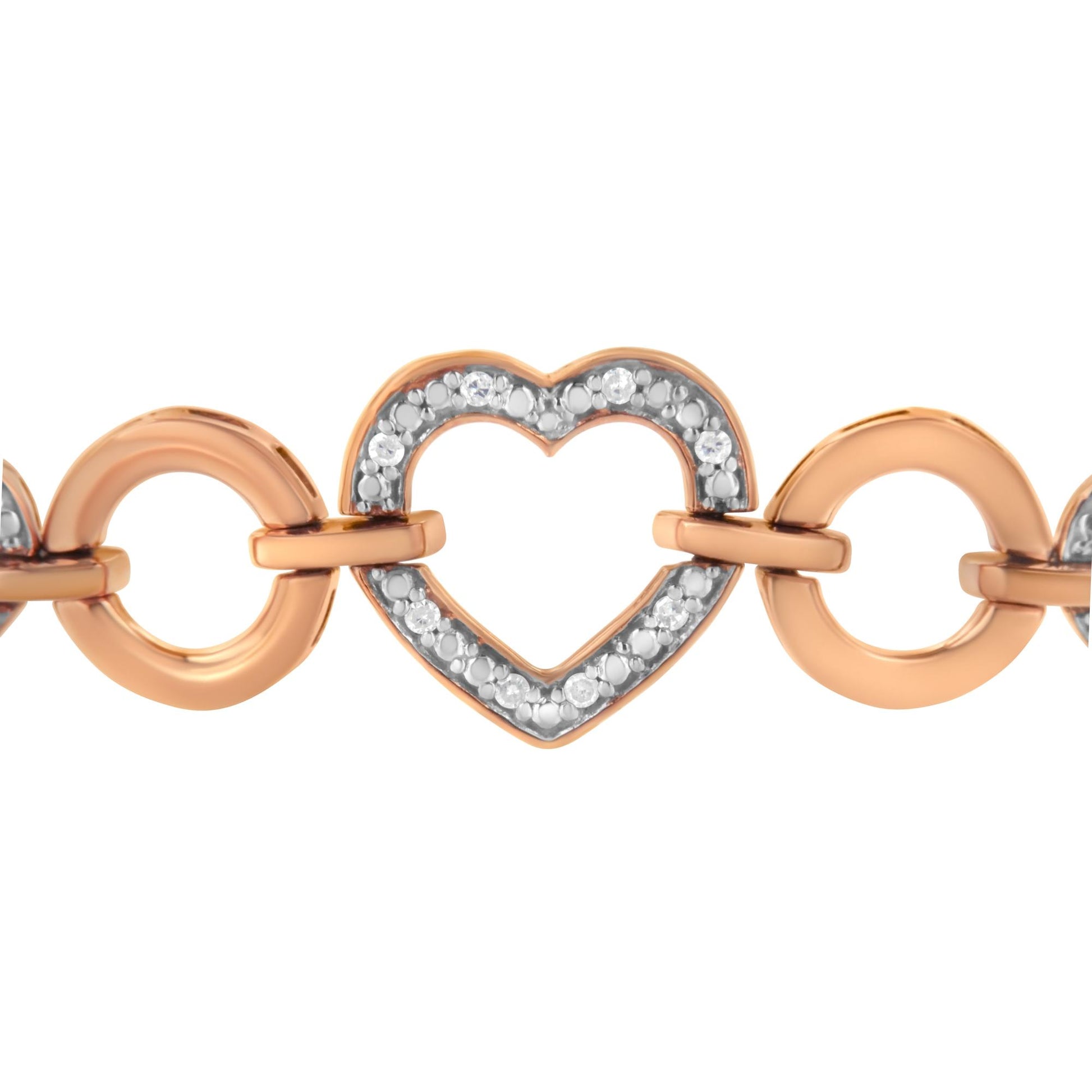 Close-up front view of a two-tone bracelet with rose-colored circular links and a heart-shaped link adorned with round white gemstones in a pave setting.