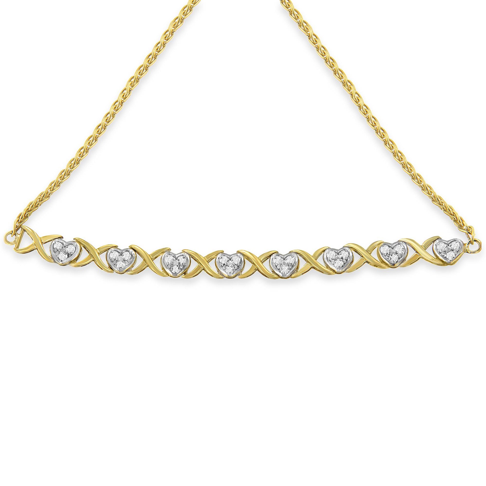 Front-facing shot of a yellow metal bracelet with heart-shaped settings containing white round gemstones in a pave setting, linked by an X-shaped design.