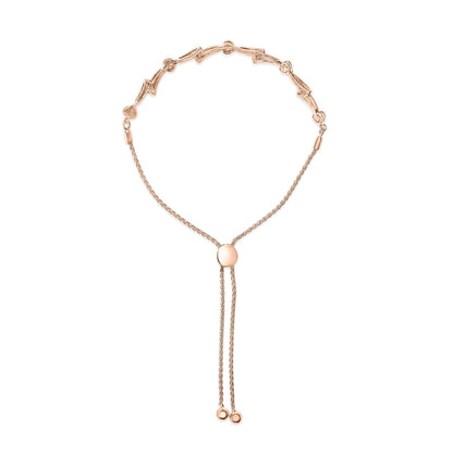 Rose-colored bracelet with heart-shaped and curved links paved with white round gemstones, shown flat from a top-down angle.