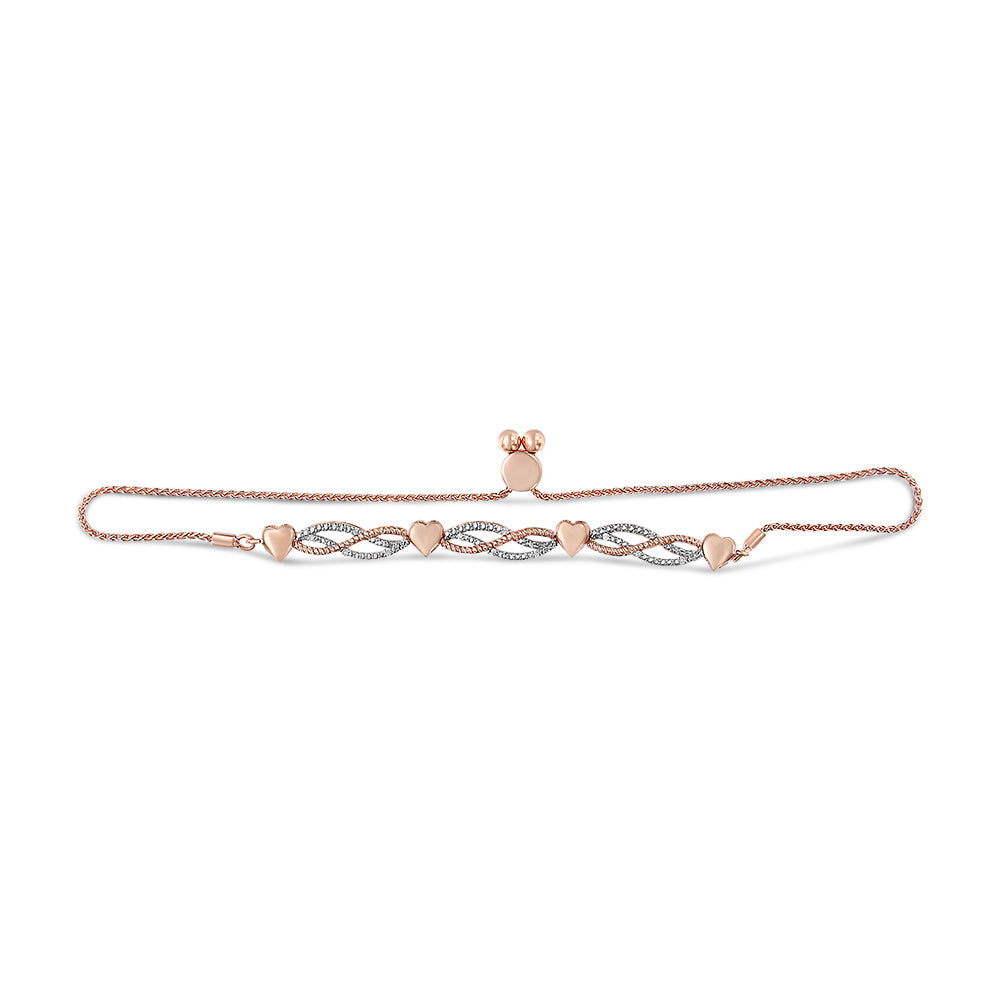 Rose metal bracelet with four heart-shaped links and alternating twisted oval links set with white round pave gemstones, displayed flat in a front-facing horizontal angle.