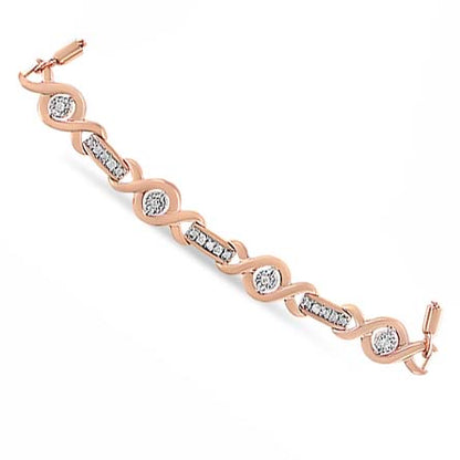 Rose-colored bracelet with alternating round white gemstones set in miracle and prong settings, shown flat on a white background from a top angle.