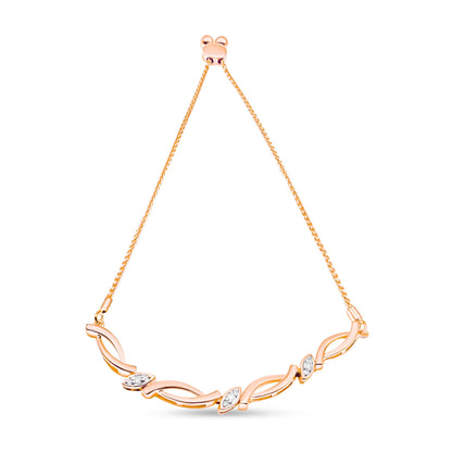 Rose-colored bracelet with intertwined links and white round pave-set gemstones, shown from a front angled view.