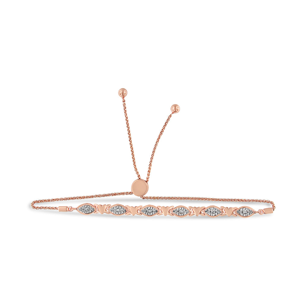 Rose metal bracelet with alternating butterfly shapes and marquise-shaped sections set with round white gemstones in a pave setting, shown from the front on a white background.