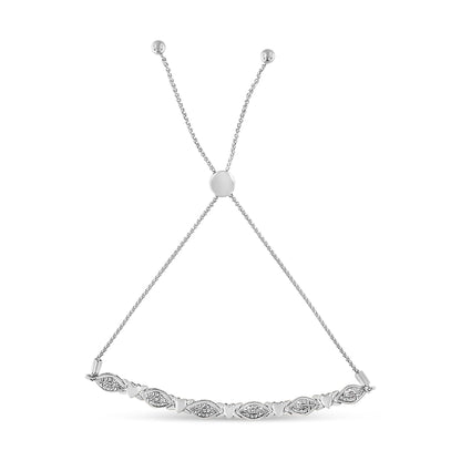 White metal bracelet with alternating heart-shaped and marquise-shaped links set with round white gemstones in pave setting, shown flat against a white background with a front-facing angle.