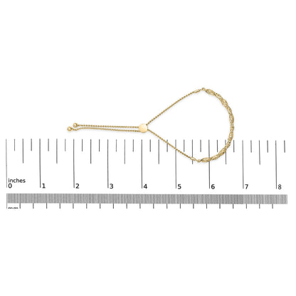 Yellow bracelet with a chain link design and a slider closure, shown flat on a ruler for size reference, top-down angle.