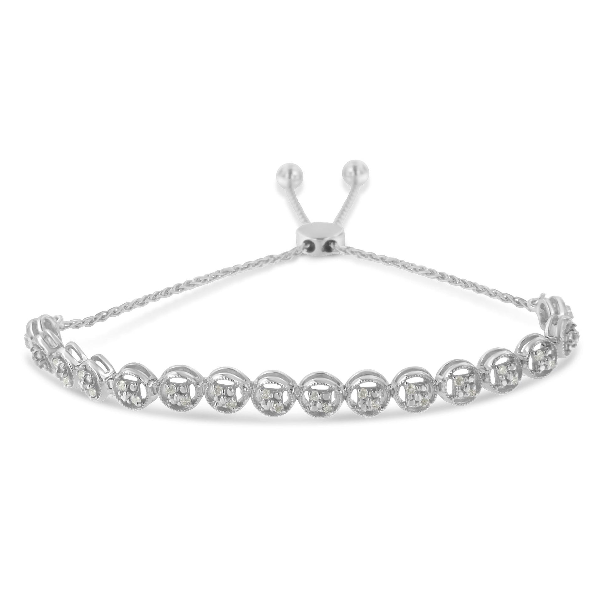 White metal bracelet with round white gemstones in prong settings, viewed from the front at a slight angle.