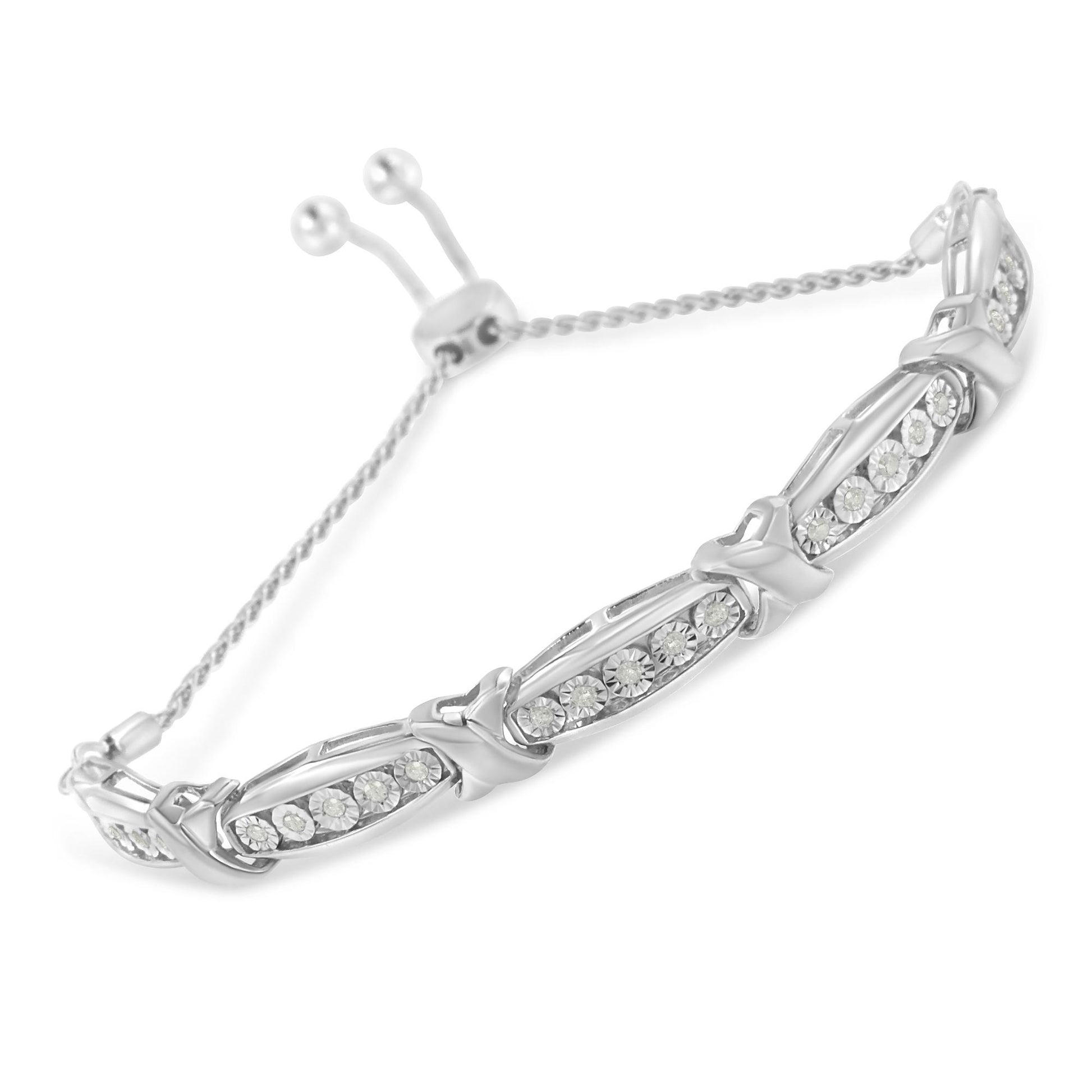 White bracelet with a tied design featuring round white gemstones in a miracle setting, shown from a slight top angle.