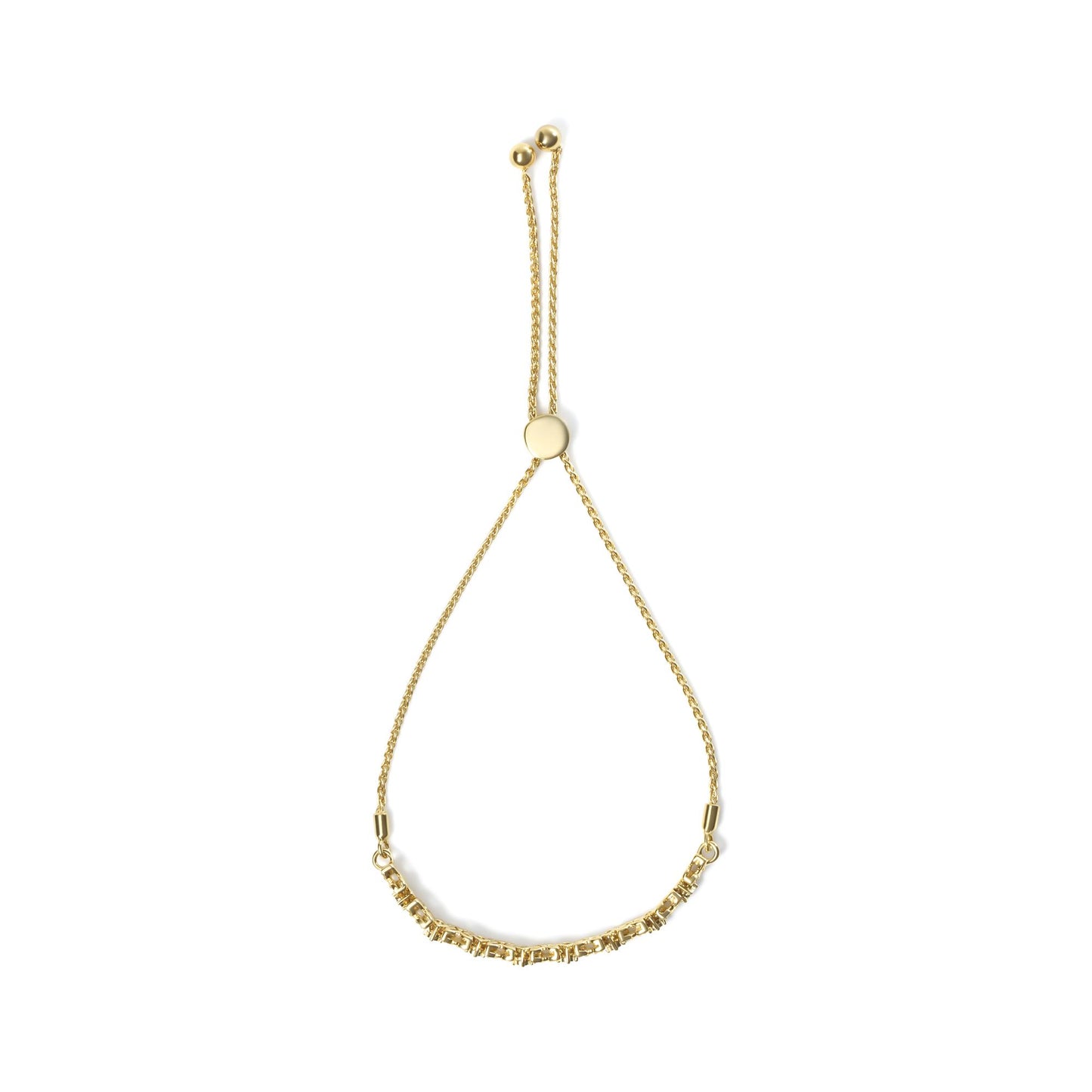 Top-down view of a yellow metal bracelet with a sliding clasp, featuring round white gemstones in prong and miracle settings along the lower section.