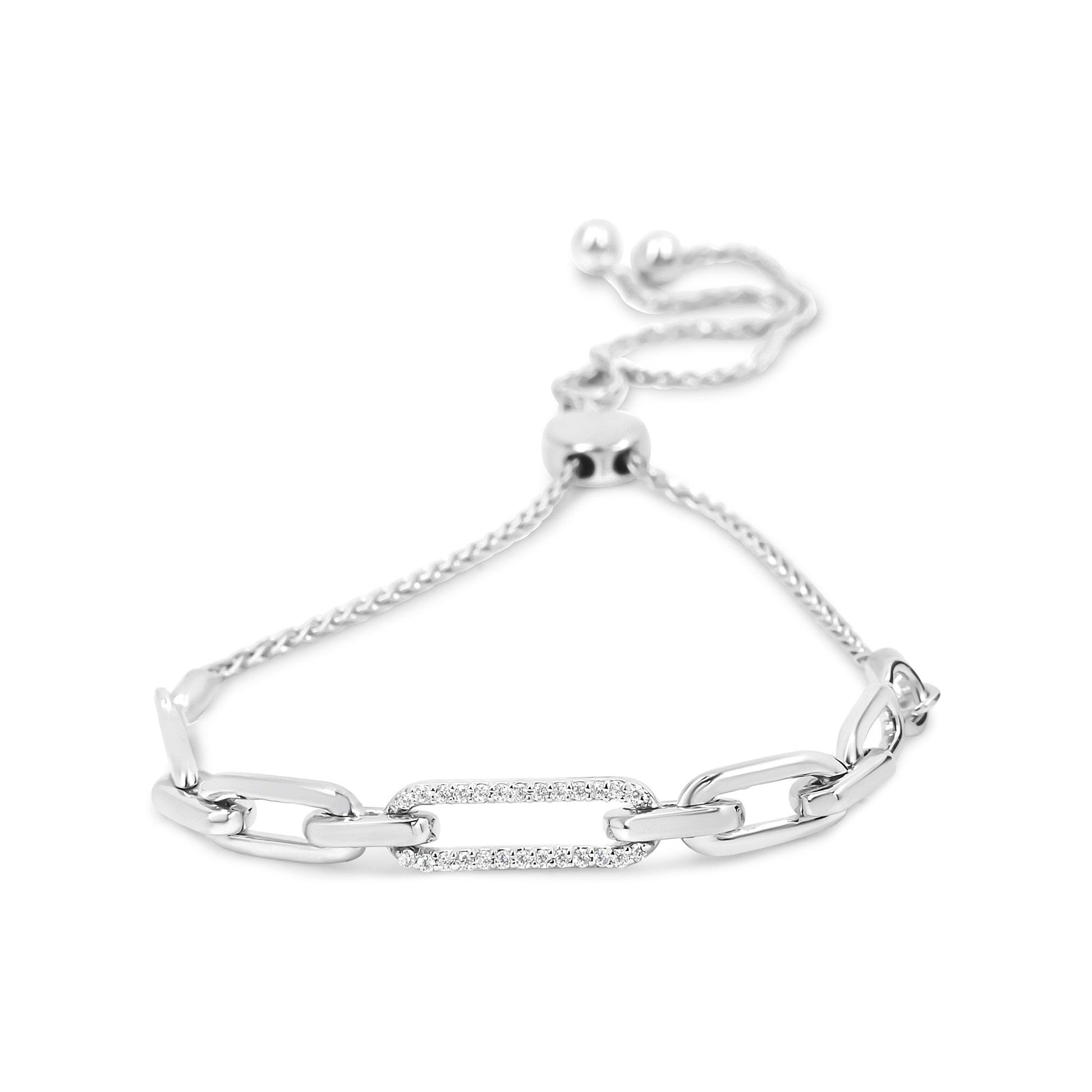 White metal bracelet with chain links and a rectangular link encrusted with white round gemstones, shown from a slightly elevated front angle.