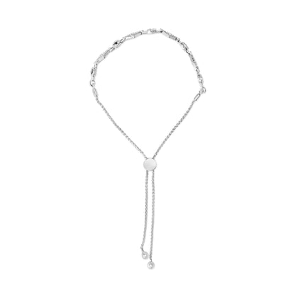 Top-down view of a white metal bracelet featuring round white gemstones in prong settings along one side and an adjustable sliding clasp with two dangling chain ends.