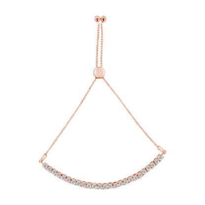 Rose-colored bracelet with a curved row of round white gemstones in miracle setting, shown from a top-down angle.