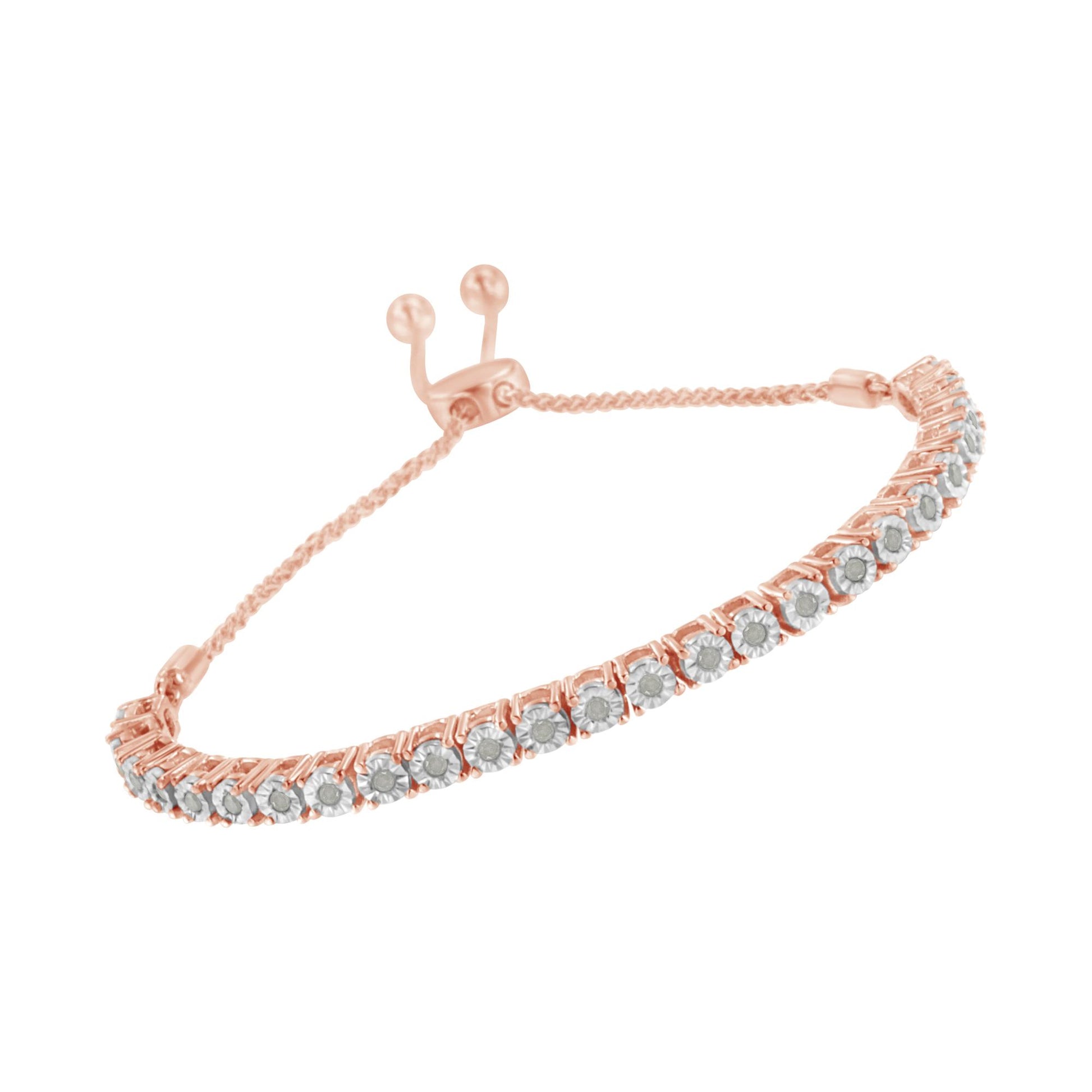 Rose metal bracelet with a row of round white gemstones in miracle setting, displayed at a slight angle.