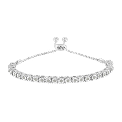 White metal bracelet with round white gemstones in miracle setting, shown from front angle.