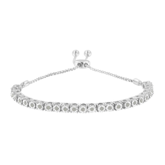 White metal bracelet with round white gemstones in miracle setting, shown from front angle.