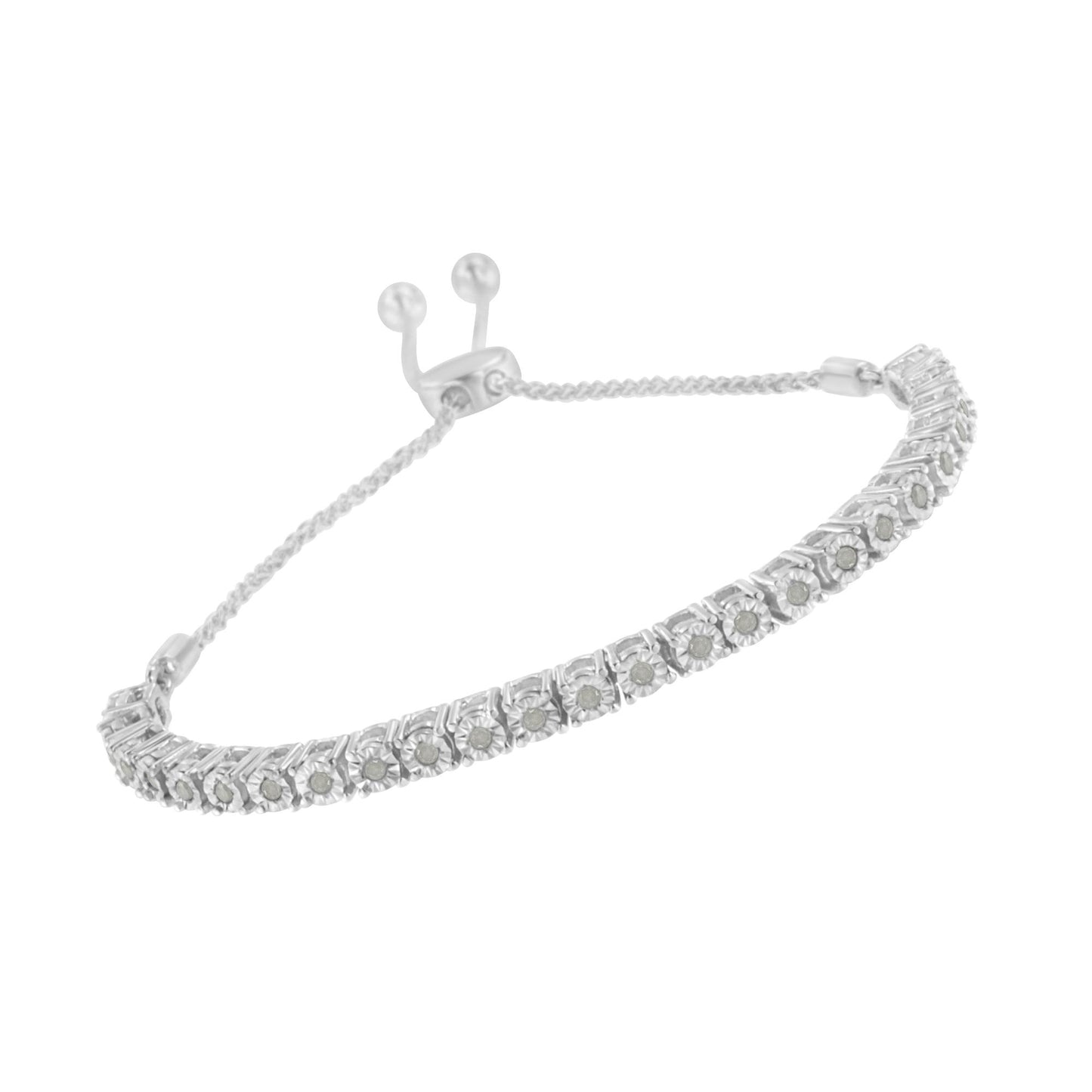White metal bracelet with round white gemstones in miracle setting, angled top view.