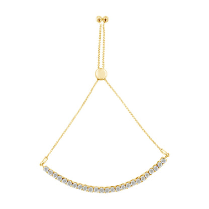 Yellow metal bracelet with a curved row of round white gemstones in miracle setting, adjustable chain shown from the front angle.