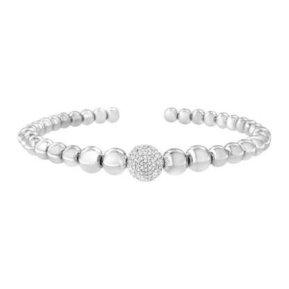 Front-facing image of an open white metal beaded bracelet featuring a central round bead pavé-set with white gemstones.