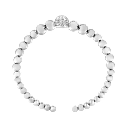 White metal bracelet with round beads and a central pavé setting of white gemstones, shown from a top front angle.