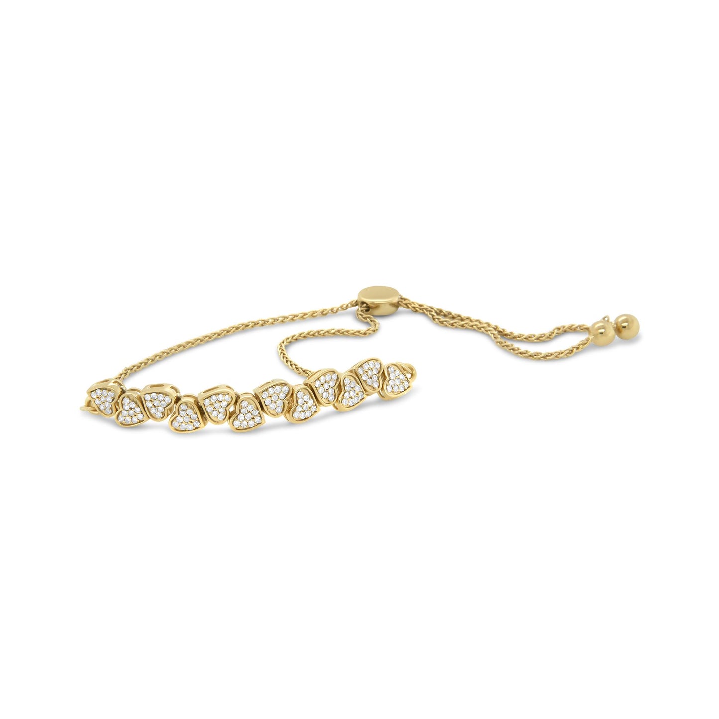 Yellow metal bracelet with multiple heart-shaped links set with white gemstones in pave setting, shown from a side angle.