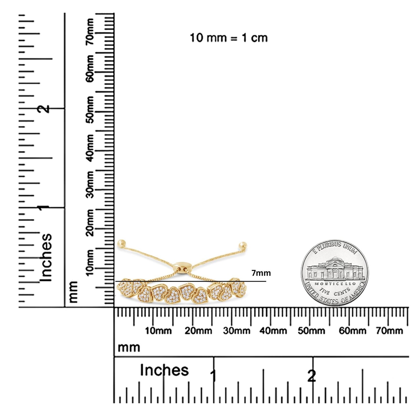Yellow bracelet with heart shapes set with white round gemstones in pave setting, shown from front on a ruler for size reference.