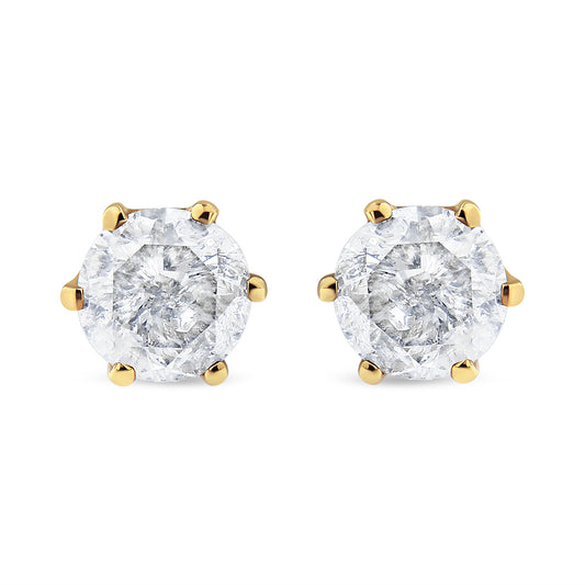 Pair of yellow metal stud earrings with round white gemstones in a six-prong setting, front-facing angle.