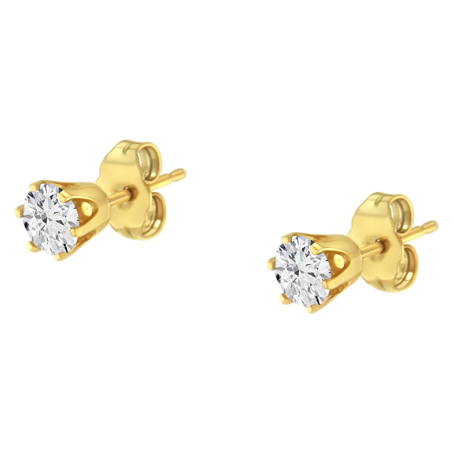 Pair of yellow metal stud earrings with round white gemstones in prong settings, shown at an angled close-up.