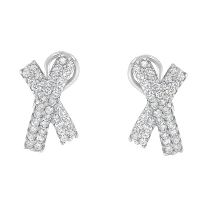 Front view of white metal earrings shaped like an 'X' covered with round white gemstones in prong settings.
