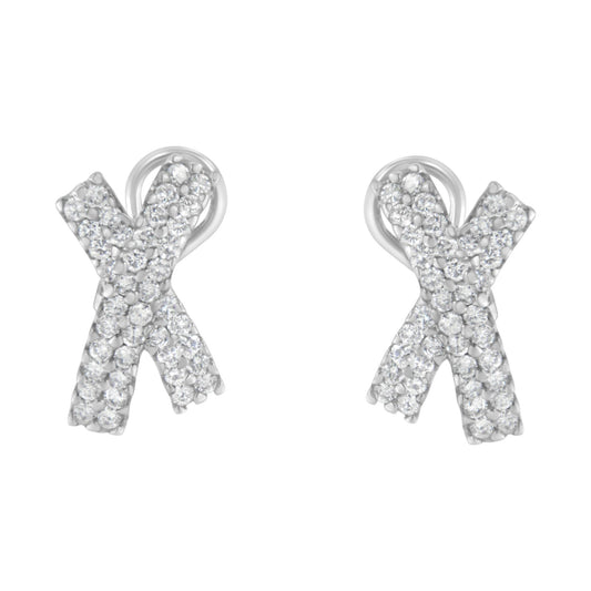Front view of white metal earrings shaped like an 'X' covered with round white gemstones in prong settings.