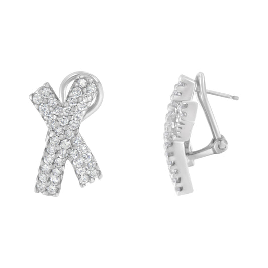 Front and side views of white metal ribbon-shaped earrings with multiple round white gemstones in prong settings, shown against a white background.