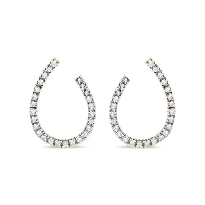 Pair of yellow metal hoop earrings set with round white gemstones in prong settings, shown from the front on a white background.
