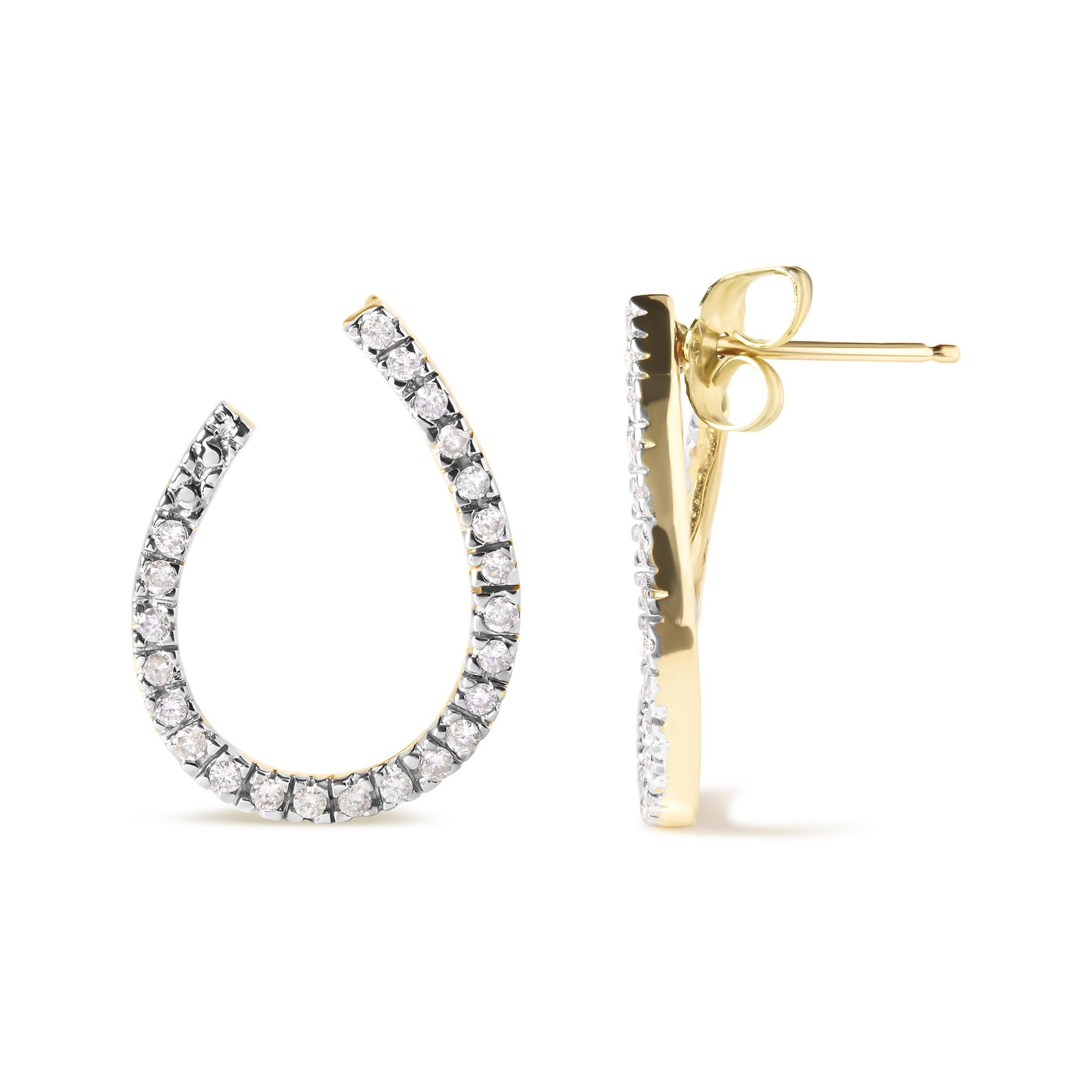 Front and side view of yellow metal open hoop earrings with round white gemstones in prong setting, photographed on a white background.