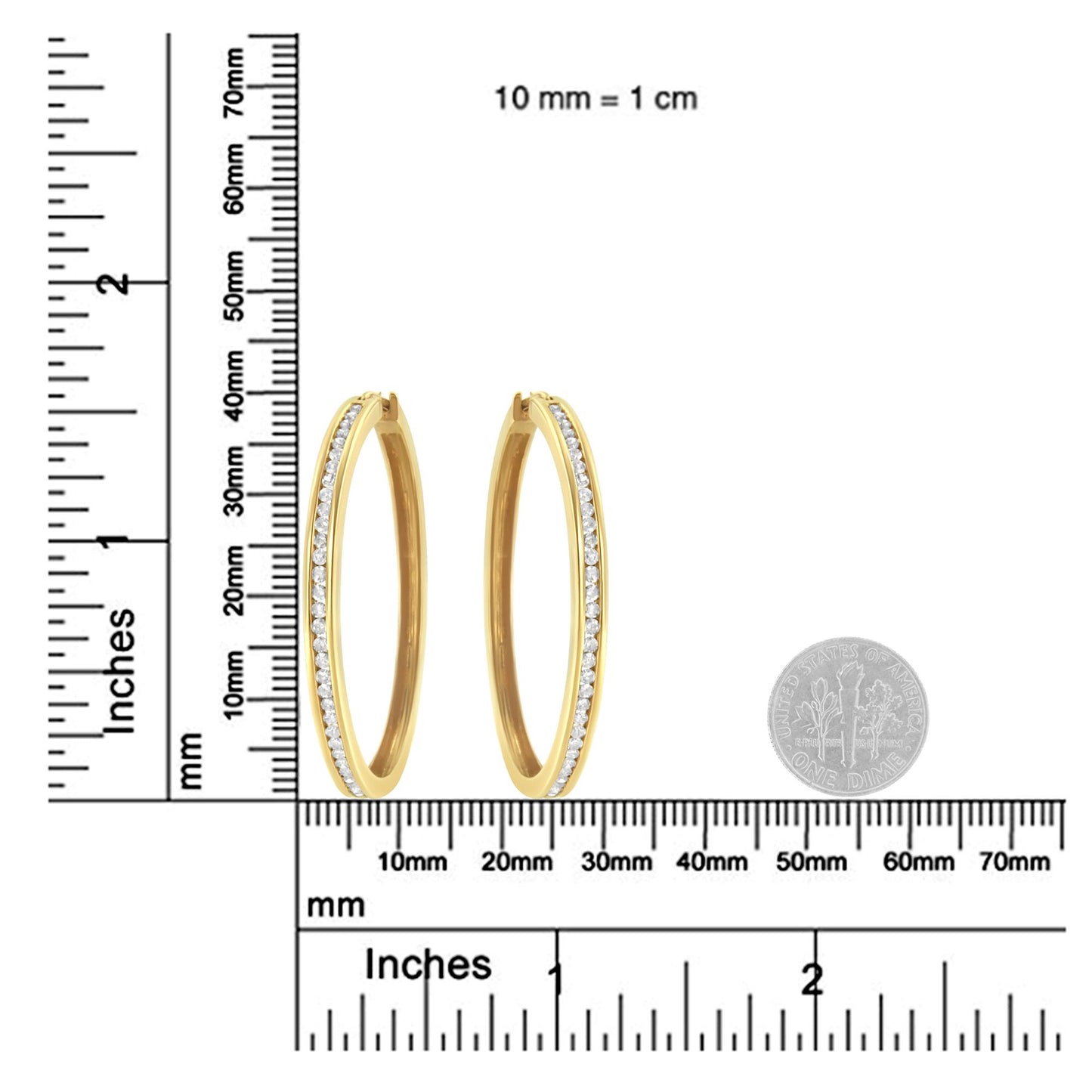 Pair of yellow metal hoop earrings with channel-set round white gemstones, shown front-facing on a ruler and scale for size reference.