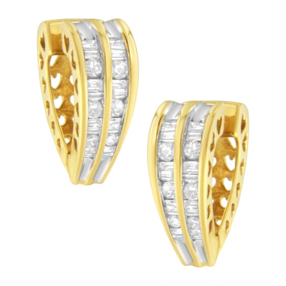 Pair of yellow metal earrings with channel-set white round and baguette-shaped gemstones, shown from a front angled view.