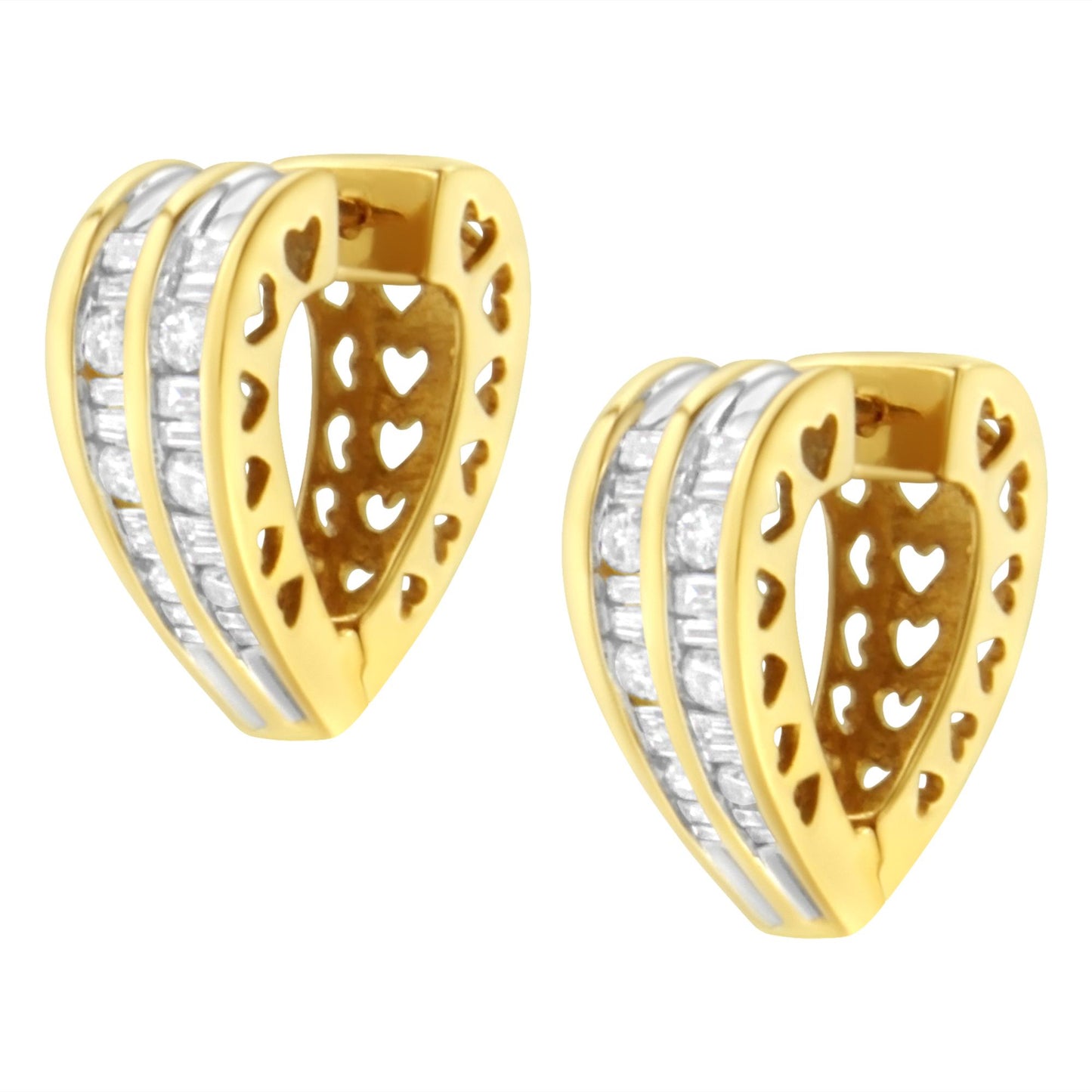 Pair of yellow metal heart-shaped earrings with openwork heart cutouts and three rows of channel-set white gemstones, shot from a front angle.