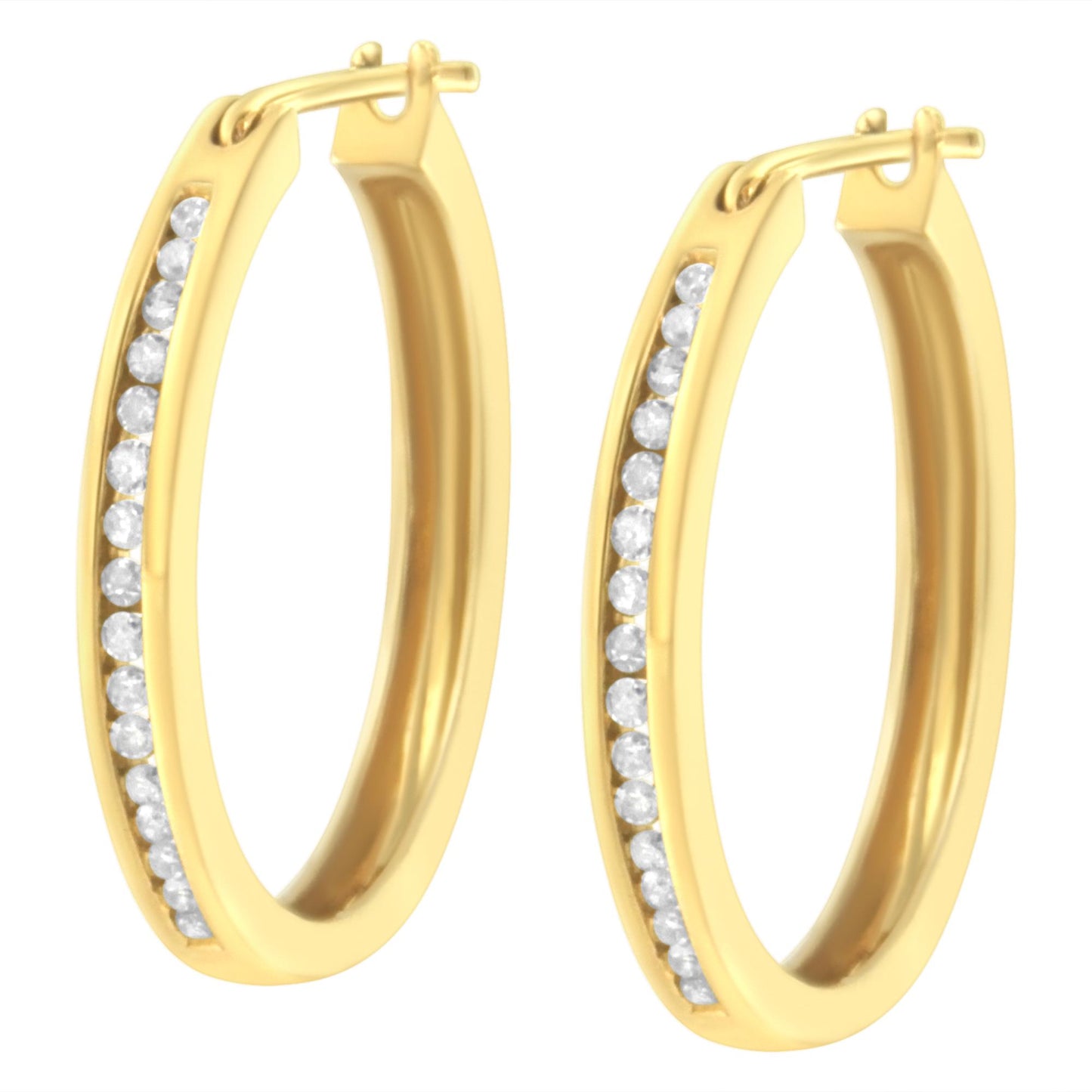 Pair of yellow metal hoop earrings with channel-set round white gemstones, shown at an angled front view.