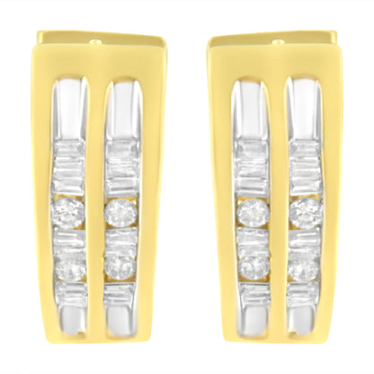 Front-facing shot of a pair of yellow metal earrings with channel-set white round and baguette-shaped gemstones arranged vertically.