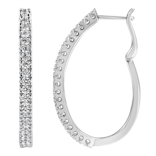 Close-up front and side views of white metal hoop earrings with round white gemstones in pave setting.